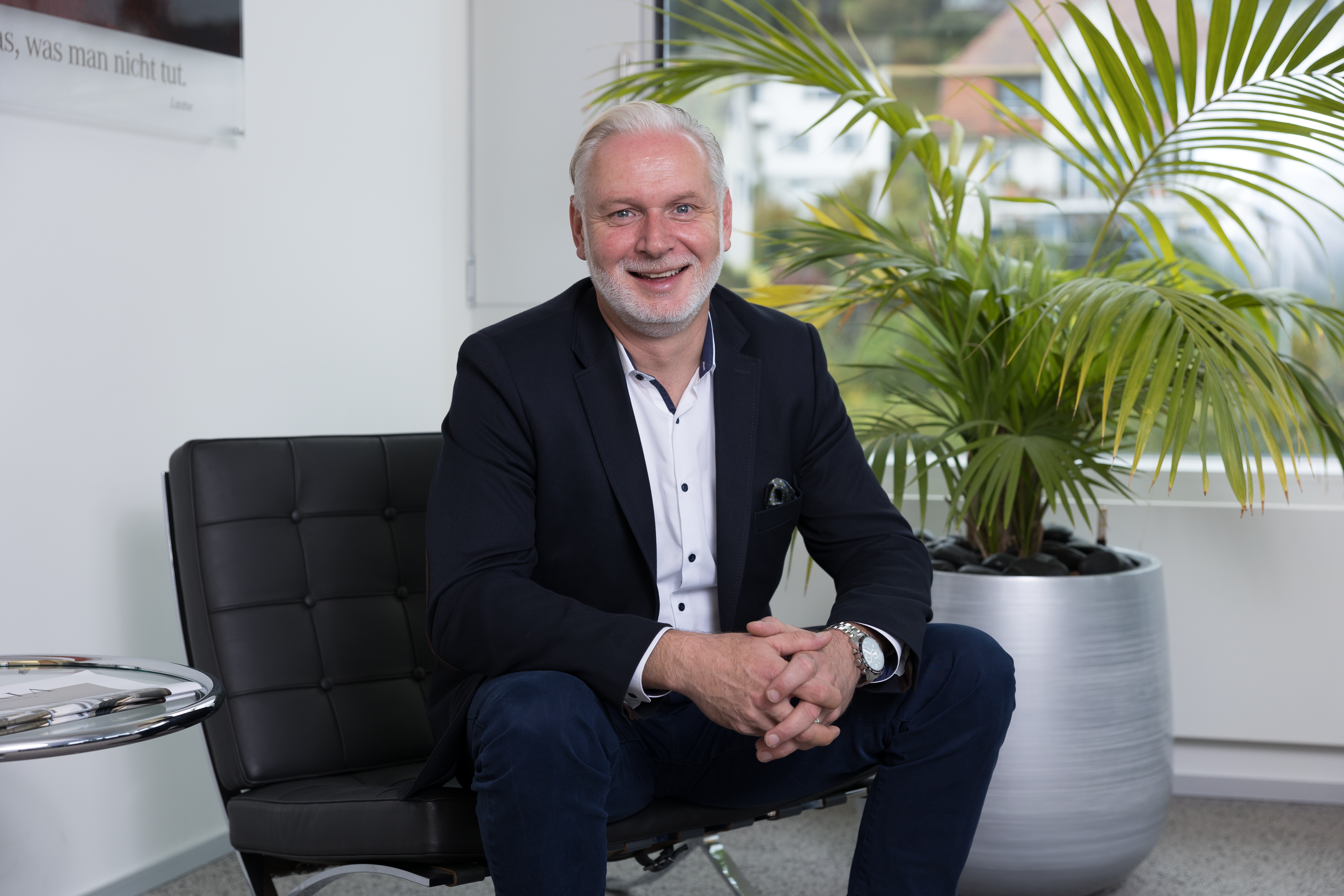 Ralph Geigle Portraitaufnahme vor neutralem Hintergrund